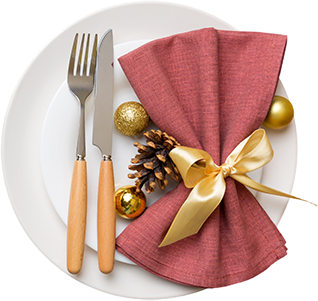 Holiday dinner table place setting with crystal-clear windows in the background — get your windows professionally cleaned before the holidays in Downingtown PA